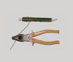 Pliers cutting the wire